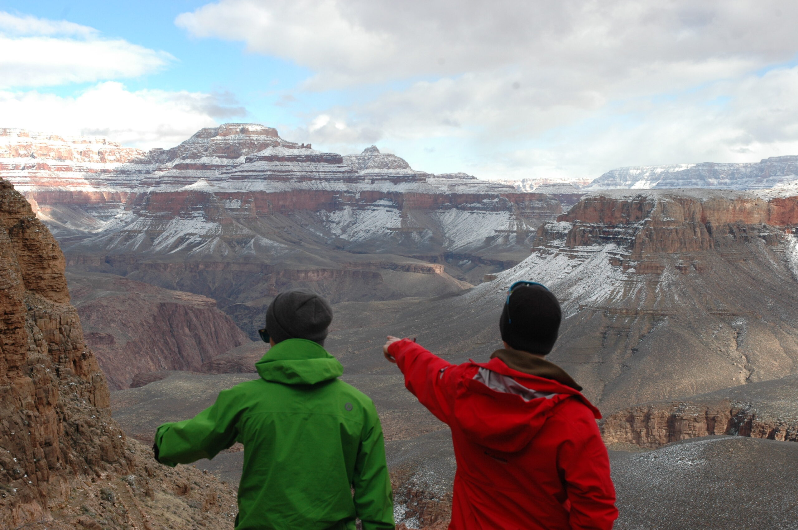 My friend Adrian (in red) and I looking out at the Grand Canyon while hiking in. Taken by Alison Bone, 2019.