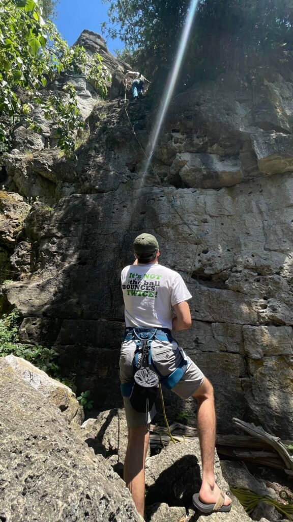 Me belaying my friend Franklin. Photo: Andrew Holowaty (2022)